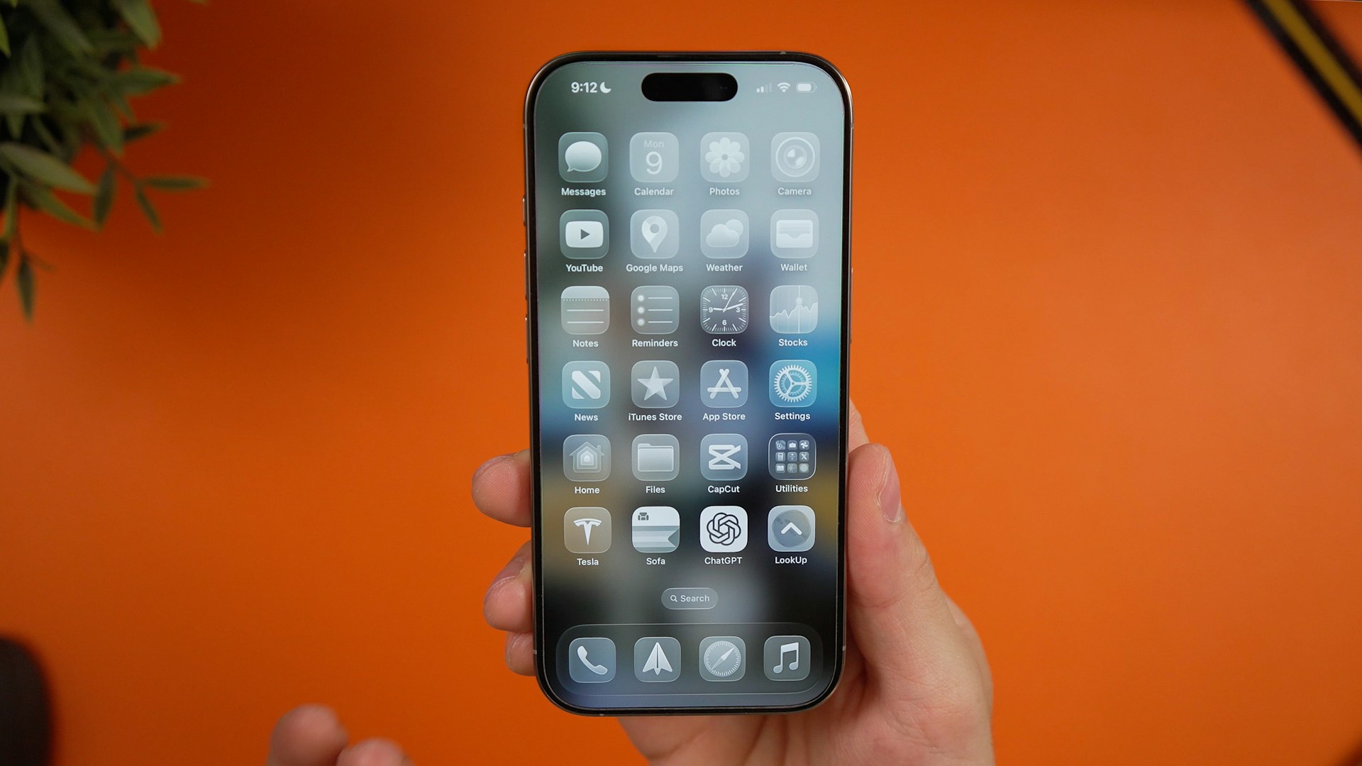 iOS 26 displayed on iphone in hand